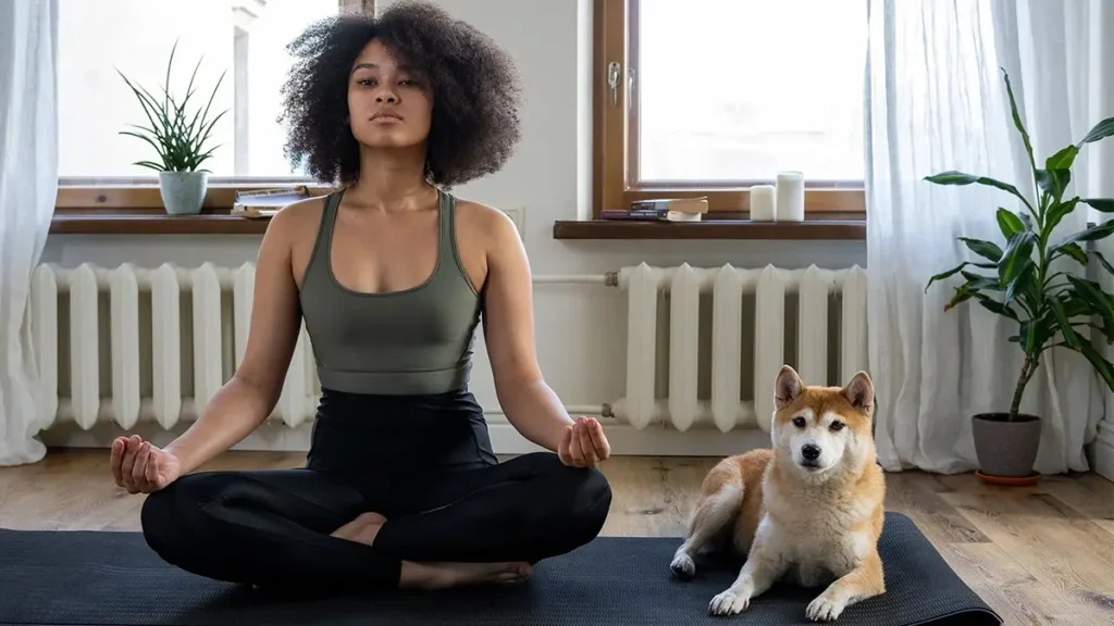 Person practicing yoga Grow Therapy