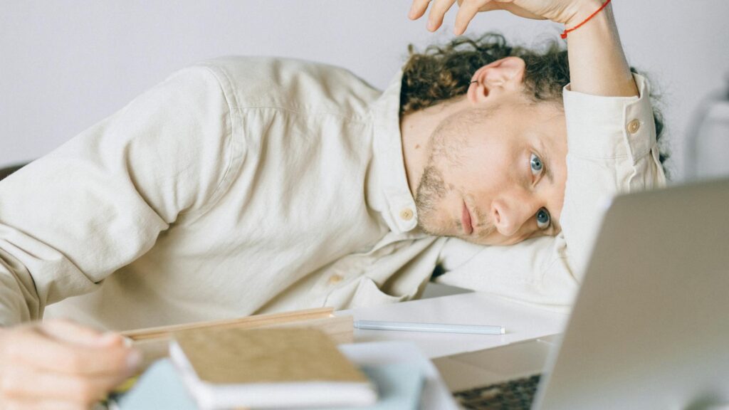 Man burnt out at desk