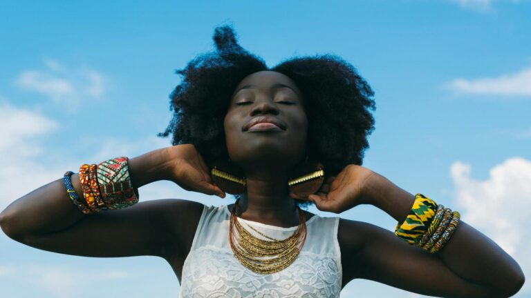 Woman faces the sun
