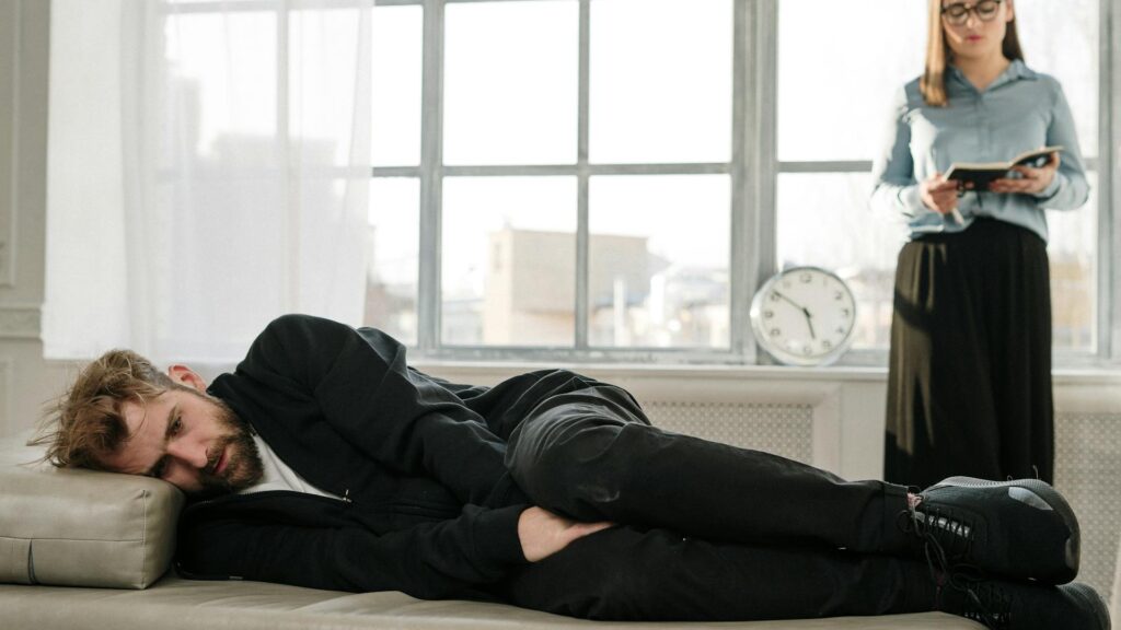 Distressed man in therapy.