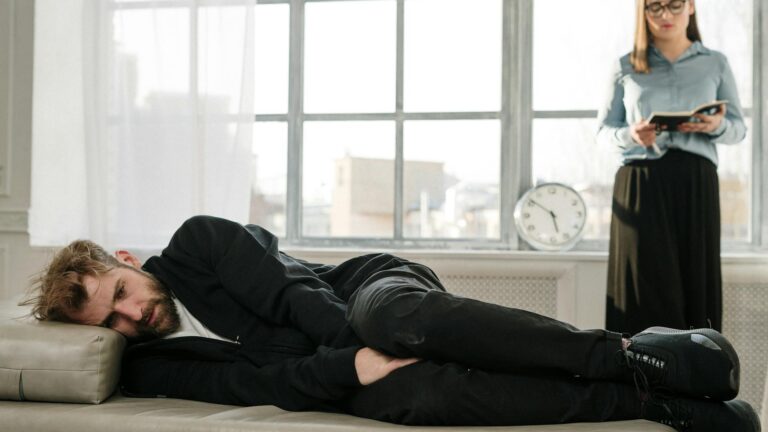 Distressed man in therapy.